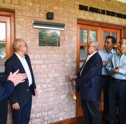 Unveiling of the Plaque by Mr. Mian Abdullah.