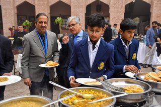 Prep School Staff Having Breakfast