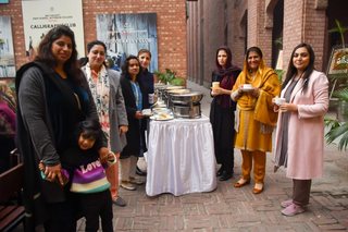 Prep School Staff Having Breakfast