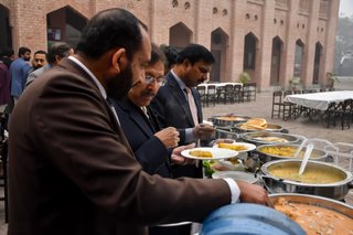 Prep School Staff Having Breakfast