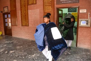 Prep School Boys collecting things for flood refugees