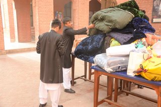 Prep School Boys collecting things for flood refugees