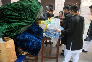 Prep School Boys collecting things for flood refugees