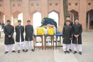 Prep School Boys collecting things for flood refugees