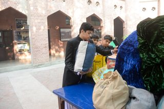 Prep School Boys collecting things for flood refugees