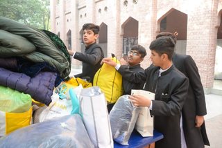 Prep School Boys collecting things for flood refugees