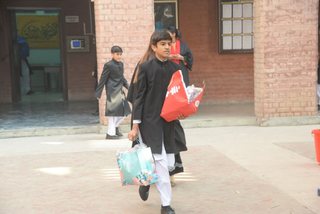 Prep School Boys collecting things for flood refugees