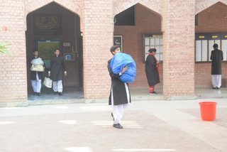 Prep School Boys collecting things for flood refugees
