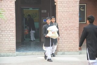 Prep School Boys collecting things for flood refugees