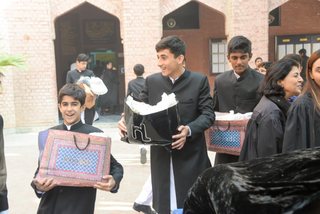 Prep School Boys collecting things for flood refugees