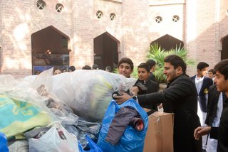Prep School Boys collecting things for flood refugees