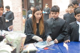 Prep School Boys collecting things for flood refugees