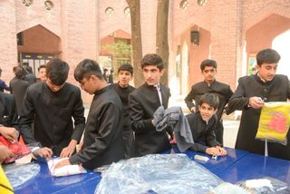 Prep School Boys collecting things for flood refugees