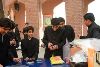 Prep School Boys collecting things for flood refugees