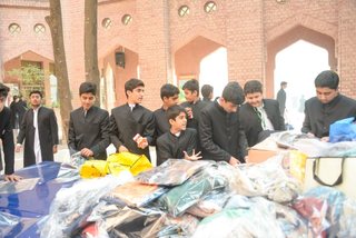 Prep School Boys collecting things for flood refugees
