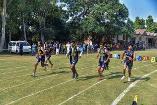 Aitchison Dominates First Day's Athletics Against Lawrence