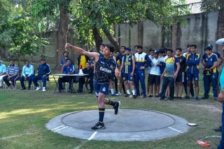Aitchison Dominates First Day's Athletics Against Lawrence