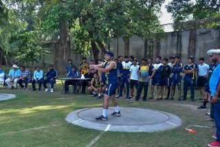Aitchison Dominates First Day's Athletics Against Lawrence