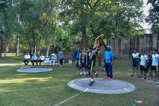 Aitchison Dominates First Day's Athletics Against Lawrence