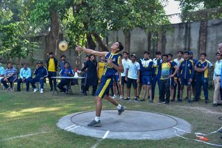 Aitchison Dominates First Day's Athletics Against Lawrence