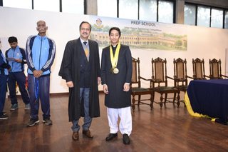 Headmaster of Prep School Awards Swimming Prizes