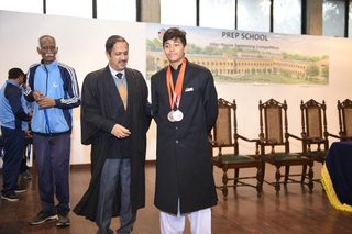 Headmaster of Prep School Awards Swimming Prizes