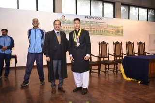 Headmaster of Prep School Awards Swimming Prizes