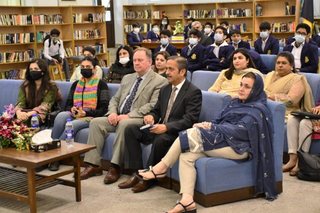 Caution! Renowned writers, torchbearers and the Principal on board.
