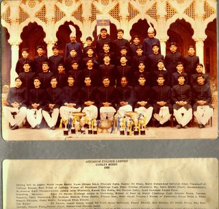 1986 - Godley House 1986. Sitting (L to R): Malik Imran Bashir Awan (House Secretary), Khurram Agha, Asghar Ali Khan, Malik Mohammad Saifullah Khan Tiwana (Full College Blazer, Best Rider of College, Winner of Aitchison Challenge Cup), Omar Iftikhar (Prefect), Mr. Tahir Sheikh (Assistant Housemaster), Mr. Masrur Kaifi (Housemaster), Junaid Jafar (Prefect), Karam Dad Wahla, Mir Haroon Zehri, Syed Hammad Amjad Raza. Standing First Row: Agha Ali Haider (College colour in swimming, Winner of Rani of Mandi Challenge Cup), Hussain Raza, Tanveer Hussain, Tahir Mahmood, Rai Shahzad Ahmad, Omar Bashir, Khawar Sher, Mehr Hayat Tiwana (Winner of Centenary Horse Show), Abdul Maquit Pirzada, Abdul Malik, Aurangzeb Khan Khichi. Second Row: Ali Akram, Jawad Saeed, Sajjad Ali Khan, Imran Mehmood, Wasim Ahmad, Asif Minhas, Ali Abbas Rizvi, Abu Bakr Jameel, Hassan Riaz, Ashraf Hayat, Mohammad Haroon Saeed. Third Row: Kamal Din (House Bearer), Omar Waqar Latif (P.M.G), Sajjad Ahmad Khichi, Aezad Mahmood, Tahir Rashid, Mohammad Asif (House Bearer)