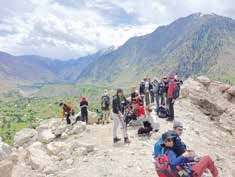 The group resting on the way to Herrloigkoႇer base camp