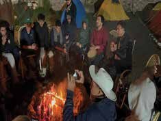 Trekkers during camp ¿re at Trashing Village