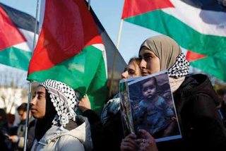 Pictured: Pro-Palestinian supporters gather outside The Hague,Netherlands on January 26th 2024